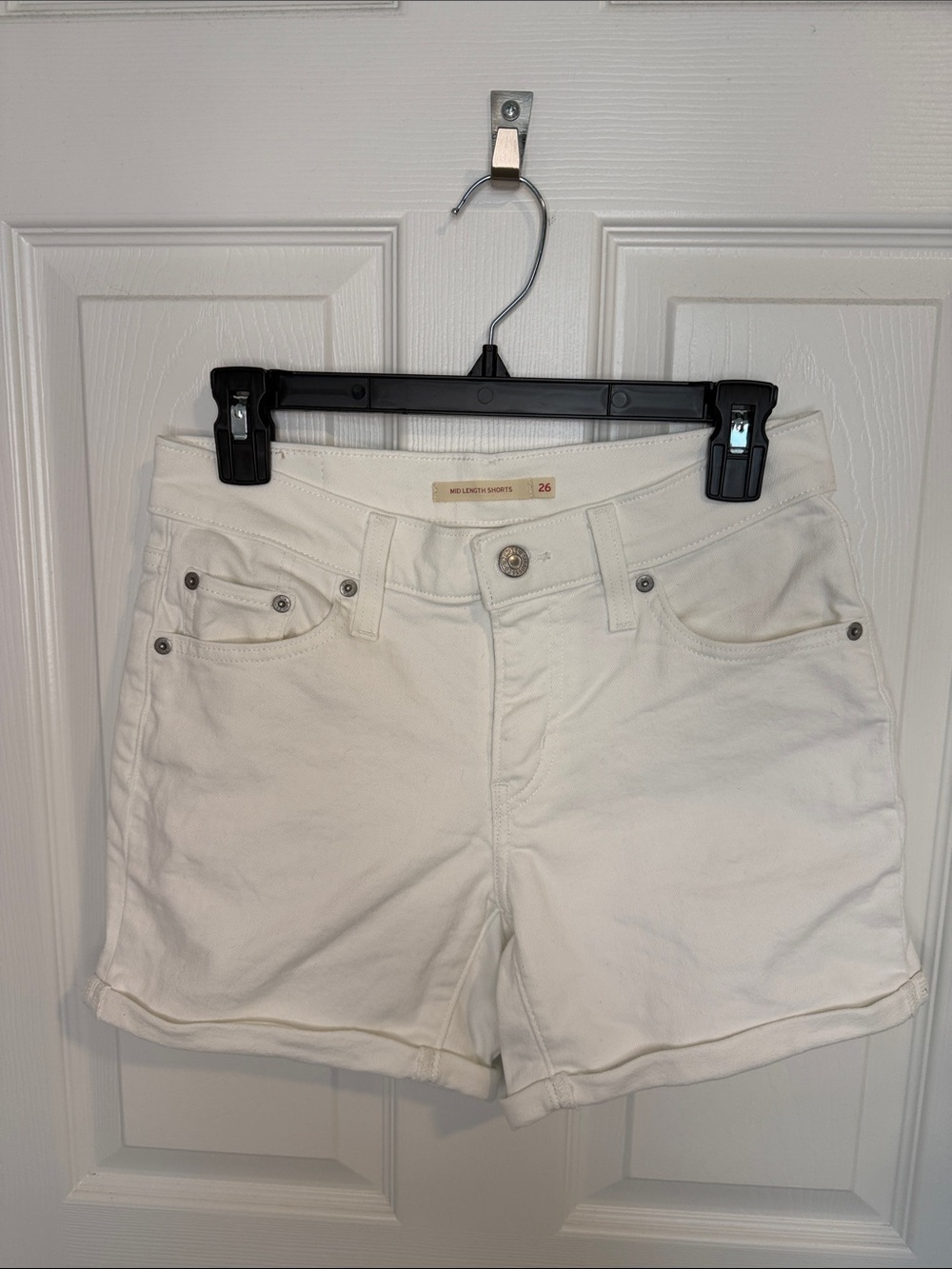 Levi’s women’s mid length white shorts